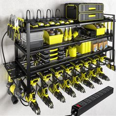 there are many yellow and black tools on this rack