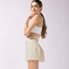 This high waist skirt exudes American charm and sophistication. Its flattering cut elongates the silhouette, while the high waist provides a slimming effect. Made with premium materials, this skirt is perfect for any upscale occasion, making you stand out in a sea of ordinary. Features: -80-90% Nylon -High Waist -Solid Color -Regular fit -Casual style White Skirts, Casual Style, High Waisted Skirt, Solid Color, High Waisted, Color