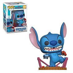 the pop vinyl figurine stitch is shown in front of a box with it's packaging