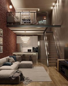 a living room filled with furniture next to a stair case