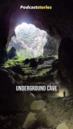 the underground cave with a man standing in it