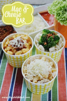 macaroni and cheese bar with broccoli on the side in yellow cups