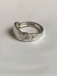 Handcrafted from a Community silver plate spoon, this floral delight is suitable for everyday and all occasions. Custom made for you in ring sizes 7 1/2 to 12. Please state ring size when ordering. Etsy Rings Silver, Orchid Ring, Wax Seal Ring, Spoon Ring, Spoon Rings, White Orchids, Everyday Rings, Ring Sizes, Jewelry Inspo