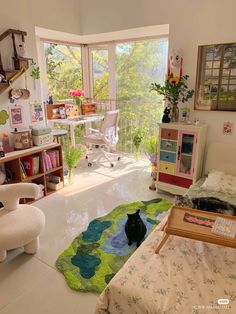 a cat sitting in the middle of a room with lots of furniture and decor on it