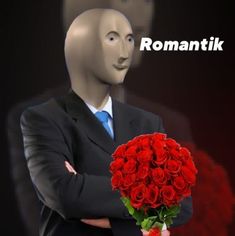 a man in a suit and tie holding a bouquet of roses with the words romantik on it