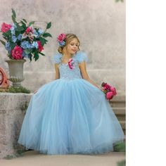 This Gorgeous Elsa Gown Is The Perfect Shade Of Blue And Reminds Me Of A Disney Princess! Lightweight But Full Floor Length Tulle Skirt That Flows Perfectly When Twirled In. The Pom Pom Style Sleeves Can Be Worn To Sit Right On Top Of The Shoulders Or Placed To Sit On The Sides For An Off The Shoulder Look. You May Also Wish To Remove These Completely If You Prefer A More Simple Look. Love This Princess Gown! The Elsa Clip Was Made To Match The Elsa Gown. This Clip Adds A Pop Of Colour To The Dr Couture, Elsa Gown, Disney Elsa Dress, Dollcake Dresses, Disney Frozen Party, Blue Ruffle Dress, Dolly Dress, Elsa Dress, Frock Dress