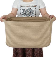 a woman holding a large basket in her hands