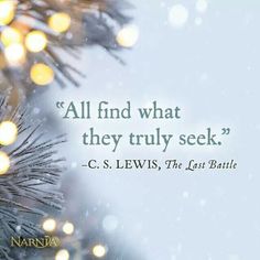 a christmas tree with lights on it and a quote from c s lewis about the last battle