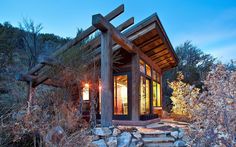 a small house with stone steps leading up to it