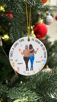 a christmas ornament hanging on a tree with the words, there's time to grow my world