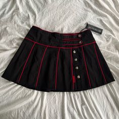 Cute Tripp Nyc X Dolls Kill Pleated Skirt In The Colors Black And Red. It Consists Of A High Waist Fit, Contrast Color Stitching, A Pleated Design, And Button Detailing. Made Of 97% Cotton, 3% Spandex. Size: Women’s S. Brand New, Unworn, With Original Tag. Product Is No Longer Available In The Official Dolls Kill Website. Retro Black Mini Skirt With Lining, Lip Service Clothing Vintage, Red And Black Clothes Aesthetic, Purple And Red Outfit, Red And Black Clothes, Red Pleated Skirt Outfit, Red And Black Fits, Red And Black Skirt, Black Striped Skirt