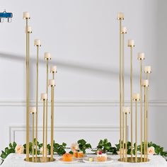 PRICES MAY VARY. Product Size: 8 arm candelabra for wedding decoration,Height: 42inch/107cm; Bottom Diameter: 9.44inch/24cm.The large base provides stable support.Suitable for candles with a diameter of 1.96inches. (Candles are not included) It can also be decorated with LED pillar candles.Increase the beautiful atmosphere of candlelight dinner and party. Floor Candle Holder Set:Elevate your decor with these exquisite 8 arm metal candle holders that exude timeless elegance.The8 arms candelabra set at different heights, they create a symmetric visual appeal, also make a striking statement piece that adds character and style to any room. Premium Quality: Our floor candelabras are made of sturdy metal materials. Through pressure casting, paint baking and other processes, it strengthens the an Extra Tall Floor Candle Holders, Gold Pillar Candle Holder Centerpieces, Floor Candle Holders Tall Overstock, Floor Candle Holders Tall Gold, Tall Gold Candelabra Wedding Table, Gold Pillar Candle Holders, Floor Candelabra, Gold Pillar Candles, Floor Candle Holders