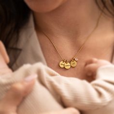 "Introducing our stunning stainless steel necklace with a captivating snake texture. This unique piece combines delicate circle pendants with the heartfelt touch of engraving your children's names on them. With the ability to engrave up to 8 names, this necklace ensuring a personalized and cherished accessory. Engraved with your precious little ones' names, this necklace is a commemoration of the love that knows no bounds. To add an extra touch of elegance, our necklace is adorned with a dazzlin Snake Texture, Necklace With Kids Names, Family Jewelry, Mother Necklace, Mommy Gift, Family Jewellery, Personalized Gifts For Mom, Mothers Necklace, Mom Necklace