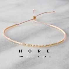 Hope Morse Code String Bracelet | Handmade by Libby & Smee Handmade String Bracelets, Mom Earrings, Best Gifts For Mom, Morse Code Bracelet, Morse Code, Silk Cord, The Hope, String Bracelet, Bracelet Handmade