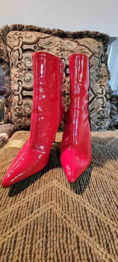 These are fun boots that look good with blue jeans.  Great for holidays or fun parties.  These are pre owned so please check out pictures carefully. back of heel had some scuffs and was painted over.  not noticeable.   These are a true size 6. Very Nice looking. Red Patent Leather Boots With Reinforced Heel, Red Latex Boots, Red Leather Knee-high Boots With Round Toe, Blue Flower Dress, Red Ankle-high Heeled Boots Medium Width, Red Pointed Toe Boots With 4-inch Heel, Women's Pumps, Womens Heels, Black Stripes