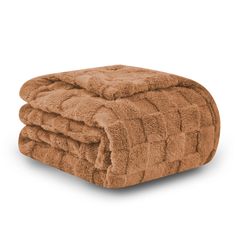 two brown towels stacked on top of each other