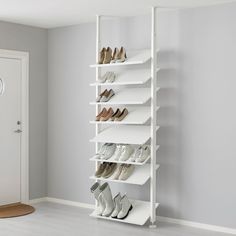 ELVARLI open storage combinationwhite36 1/8x14 1/8x87 1/4-137 3/4Make your ELVARLI storage solution into a home for your booksclothes or a lovely display of decorative itemsShelvesclothes rails and height adjustable post will help you utilize your full spacefrom floor to ceilingAluminum. Book Shelves As Shoe Racks, Book Shelf Shoe Storage, Closet Wall Shoe Storage, Ikea Shoe Shelves, Basement Shoe Storage, Shoe Displays For Boutiques, Floor To Ceiling Shoe Storage, Show Storage In Closet, Wall Shelves For Shoes