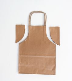 a brown paper bag with a handle on it