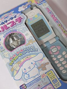 an electronic toy phone in its packaging