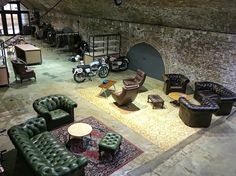 a room filled with lots of furniture and motorcycles