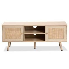 an entertainment center with wicker doors and drawers