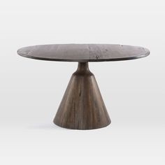 a wooden table with an oval top and two small round bases on the base,