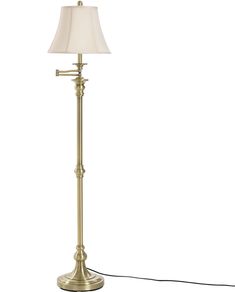 a floor lamp with a white shade on it and a cord attached to the base