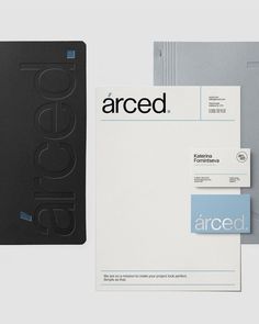 an assortment of business cards and envelopes with the word arced printed on them