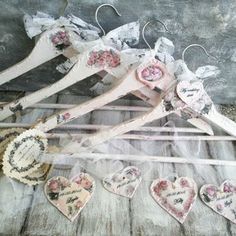 some clothes hangers with hearts on them