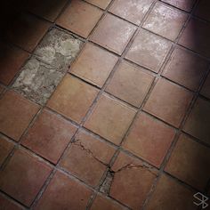 an image of a floor that has been cracked and needs to be cleaned or sealed