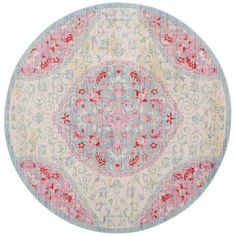 a white and pink circular rug with flowers on it's center, in front of a white background