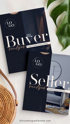 two book covers sitting on top of a table next to a basket and potted plant