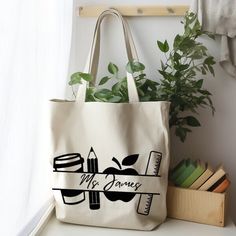 a tote bag sitting on top of a white shelf