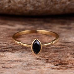 "Tiny Black Obsidian Ring, Marquise Gemstone Ring, Gold Ring, Stacking Black Ring, Dainty Obsidian Ring, Personalized Gift, Promise Ring Size:- All Size Available In Variation Metal:-brass Stone:- Black Obsidian IMPORTANT NOTE....👇 1 ring free gift on purchase of 1 product. 1 earrings and 1 ring free gifts on purchase of 3 products. ❥ Customers' satisfaction is our biggest priority, please contact us with any questions/queries for future or existing orders, and we will do our best to make sure Dainty Black Ring Jewelry, Adjustable Black Dainty Ring, Black Obsidian Rings For Gift, Elegant Obsidian Ring Jewelry, Black And Gold Ring, Sagittarius Things, Pretty Trinkets, Black Obsidian Ring, Obsidian Ring