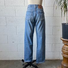 These 1980's vintage Levi's 505XX jeans are made from a light washed, medium weight, cotton denim and feature a high waisted, straight leg fit with the perfect amount of fade and distressing throughout. Zips up in front with a YKK zipper to a single button closure at the waist. In overall excellent vintage condition with only normal signs of wash and wear. Marked a size 30x32, see below for measurements 29" waist 38" hips 11" rise 32" inseam 7" leg opening Faded Jeans, Ykk Zipper, Womens Jeans, 1980s Vintage, Vintage Levis, Levis Jeans, Favorite Outfit, Levi's, Zip Ups