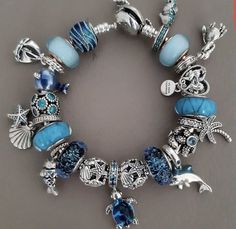 Pandora Bracelet Light Blue, Colourful Pandora Bracelet, Pandora Bracelet Aesthetic Blue, Pandora Bracelet Blue Theme, Blue Pandora Charms, Blue Pandora Bracelet, Pandora Azul