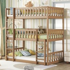 a wooden bunk bed sitting in a bedroom next to a wall with stripes on it