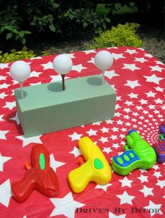 an image of a birthday party with toys on the table and text that reads, a carnival / circus themed birthday party