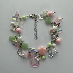 a close up of a bracelet with charms