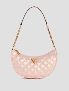 Iridescent diamond-quilted pebbled faux-leather shoulder bag Curved half moon silhouette Antique gold-tone hardware Enamel signature triangle emblem Multiple interior pockets Cotton-blend lining Top zip closure Chain and faux-leather shoulder strap with 11" drop 7" W x 4" H x 2" D Cute Shoulder Bags, Popular Purses, Bag Guess, Designer Purses And Handbags, Moon Silhouette, Quilted Shoulder Bag, Handbag Essentials, Guess Purses, Bow Bag