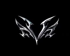 an image of a black background with white and grey designs on it, in the shape of two wings