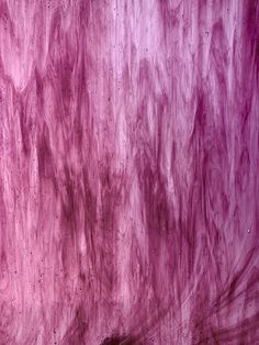 an abstract painting with pink and purple colors