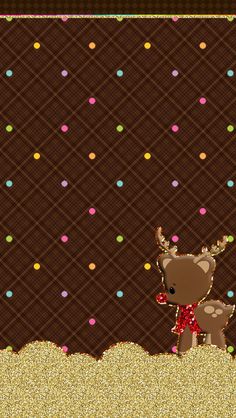 a brown deer standing on top of a pile of dirt next to a wall covered in confetti