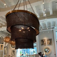 a chandelier hanging from the ceiling in a store