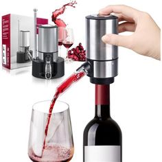 a person is pouring red wine into a glass next to a bottle and an electric device