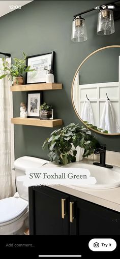 the bathroom is decorated in green and white