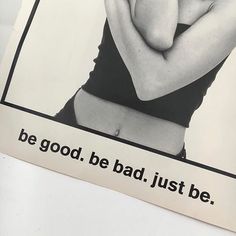 a woman in a bathing suit with her arms crossed and the words be good be bad just be