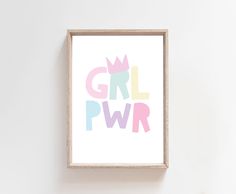 a pink and blue print with the word girl power in pastel colors on it