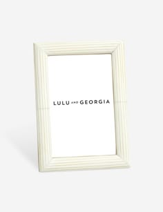 a white frame with the words lulu and georgia on it