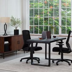 Texture and minimalism. Handcrafted from solid mango wood, this desk features delicate, tactile reeding around the edge of its desktop, resembling the edge of a coin. Natural wood grain variation warms up its stark silhouette, while black-finished sled legs layer in contrast. AllModern Color: Black AllModern Urbana Solid Wood Desk in Black | Size 30" H X 56" W X 30" D Grey Desk, Solid Wood Desk, Kitchen Must Haves, Dorm Essentials, White Desks, Kitchen On A Budget, Wood Desk, Solid Mango Wood, Menu Furniture